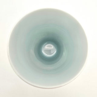Toki Meki Workshop Medaka Series small celadon porcelain cup with subtle blue gradient inside.